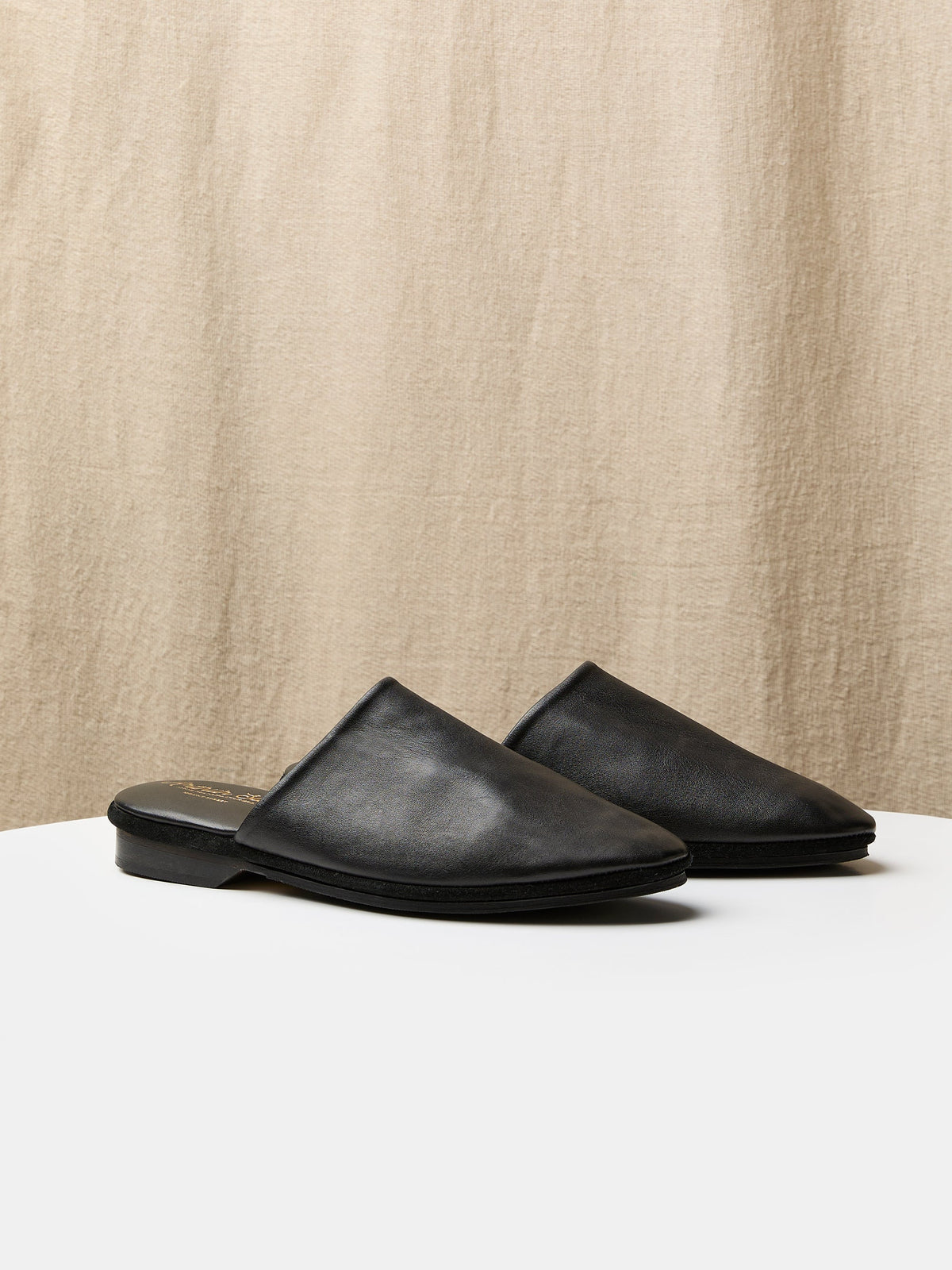 Song-i Mules in Black Calf Leather
