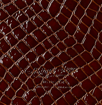 Embossed crocodile calf in chocolate