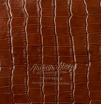 Embossed crocodile calf in cognac