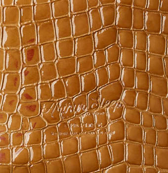 Embossed crocodile calf in honey