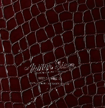 Embossed crocodile calf in pecan