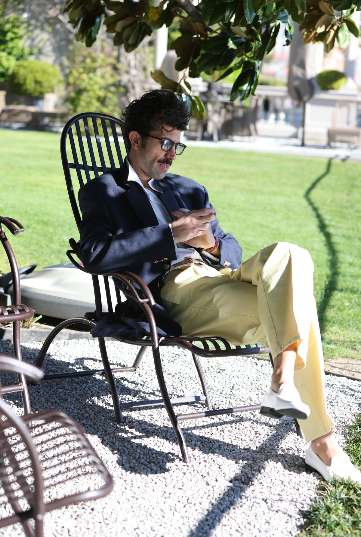 Ata, seated in a garden