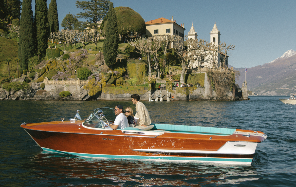 A wooden motorboat on an Italian lake